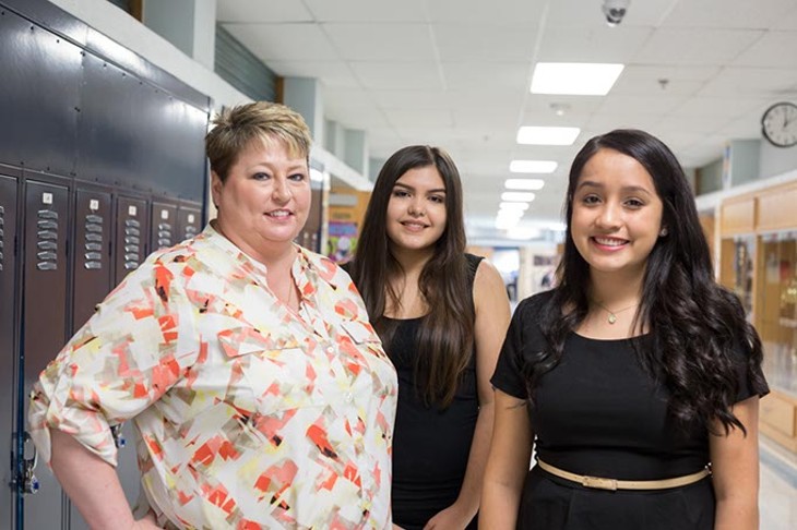Principal, Mylissa Hall, and two AP students pose for a photo at Southeast High School on Wednesday, September 21, 2016 in Oklahoma City. - EMMY VERDIN