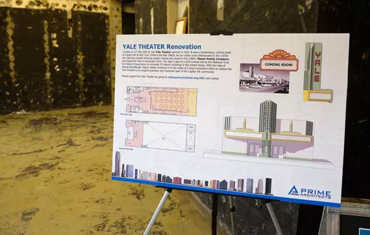 A display board positioned in the entrance of the Yale Theater highlights the plans of developers Aimee Ahpeatone and Steve Mason. The theater dates back to 1918, a year from now, it should once again light up SW 25th Street in Calle Dos Cinco in Historic Capitol Hill. (Garett Fisbeck)