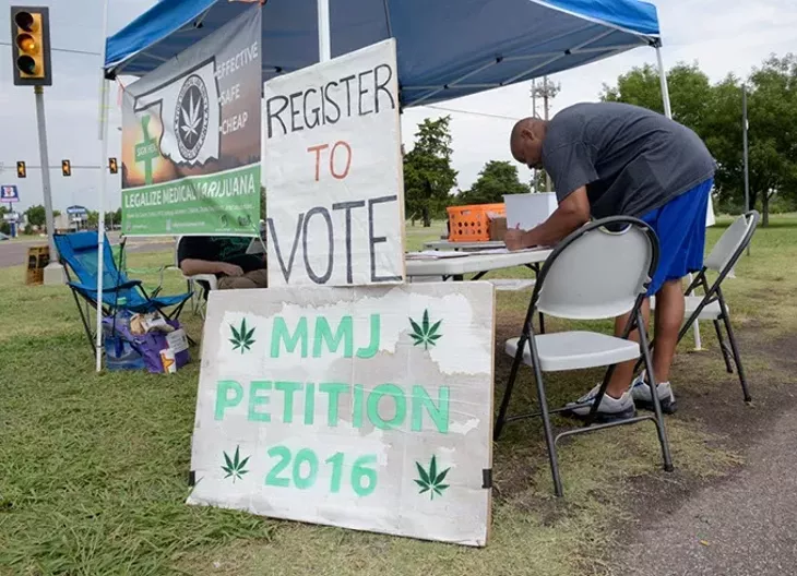 A petition signing put on by Oklahomans for Health, Tuesday, July 26, 2016. - GARETT FISBECK