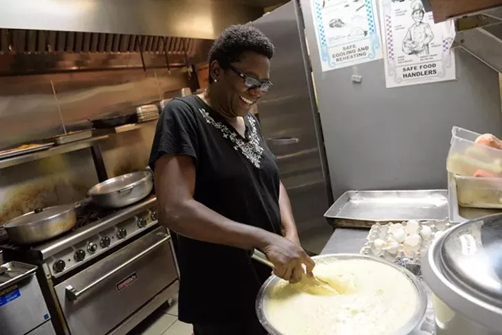 Sharon McMillan said making Carican Flavors feel like home to customers requires a taste of her Trinidadian cooking. (Garett FIsbeck)