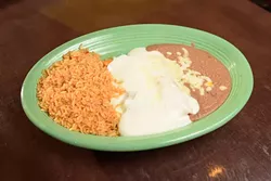 Sour cream chicken enchilada? at Tarahumara's in Norman, Monday, Oct. 31, 2016. - GARETT FISBECK