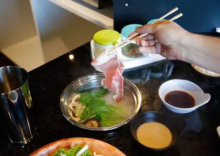 Shabue Shabu at Muu Shabu in Edmond, Friday, June 17, 2016. - GARETT FISBECK