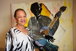 Anita Arnold poses for a photo at Black Liberated Arts Center, Friday, May 13, 2016. - GARETT FISBECK