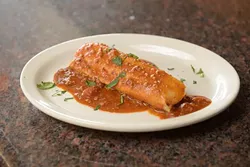 Pork tamale enchilada? at 1492, Friday, Dec. 16, 2016. - GARETT FISBECK