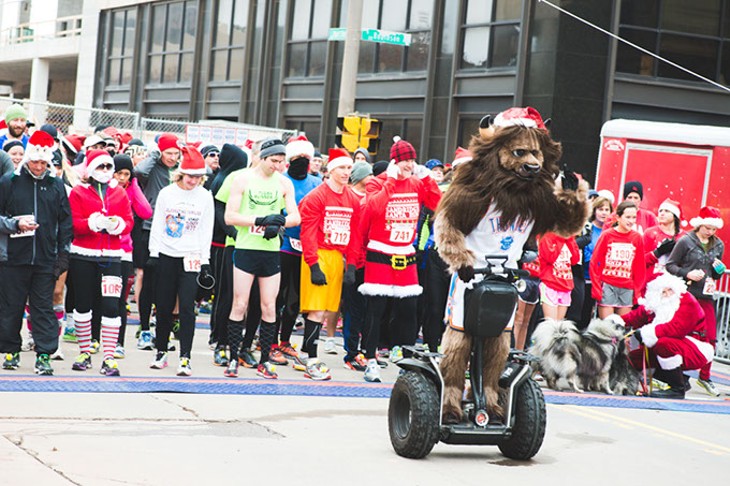 Oklahoma City Thunder mascot Rumble leads runners during Downtown in December&#146;s Sandridge Santa Run. This year&#146;s event is Dec. 10. | Photo provided - QUIT NGUYEN