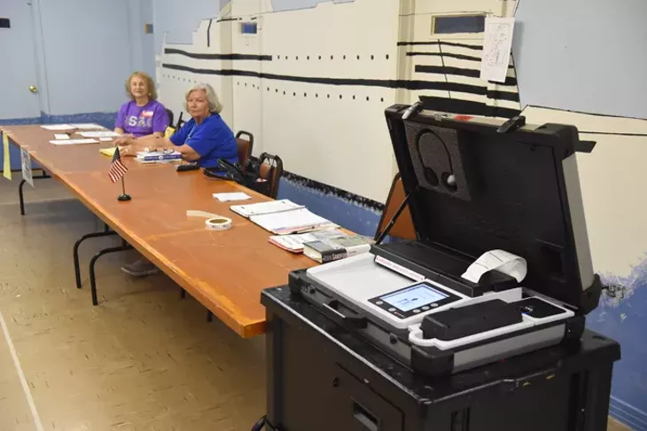 Election officials, left, Eva Welch and Mary Austin, at thier station during the election on 7-14-15 at Crown Heights Church of the Nazarene. mh
