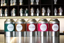 Interesting tea varieties, including Golden Monkey, line the walls at Urban Teahouse. (Garett Fisbeck)
