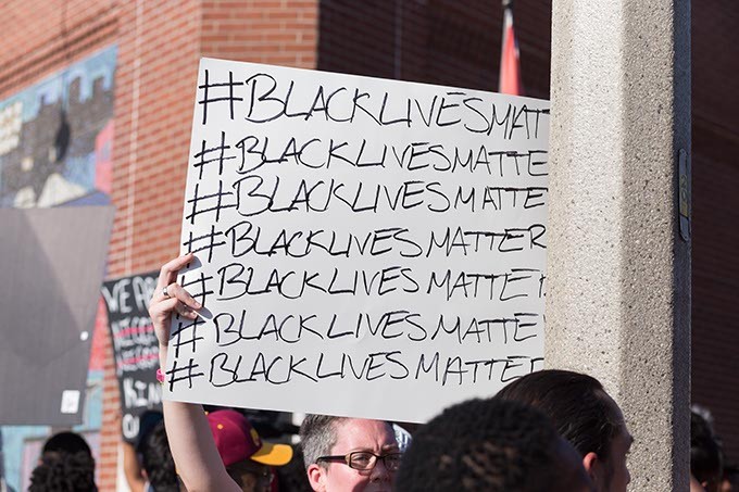 Protestor holds a sign at the Black Lives Matter protest on Sunday, July 10, 2016 in Oklahoma City. - EMMY VERDIN