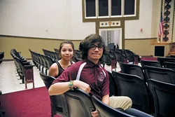from left Angelica Herrera and Jesus Medrano, seated in their school’s auditorium, are two of the 143 students enrolled in Capitol Hill High School’s Academy of Arts. | Photo Laura Eastes