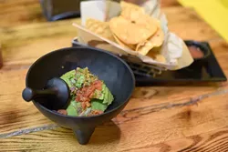 Customers decide how chunky to make the DIY guacamole. | Photo Jacob Threadgill