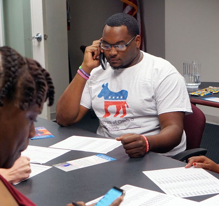 Joshua Harris-Till, who serves as Young Democrats of Oklahoma president, makes calls to voters in Senate District 45 in support of the Democratic candidate. (Photo Megan Nance)