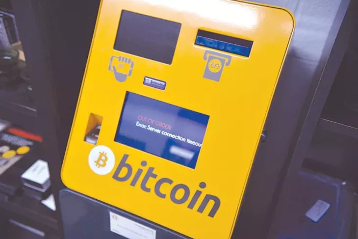A bitcoin vending machine installed by L’Argent Services at Coin and Gold Exchange at 7714 N. May Photo Jacob Threadgill