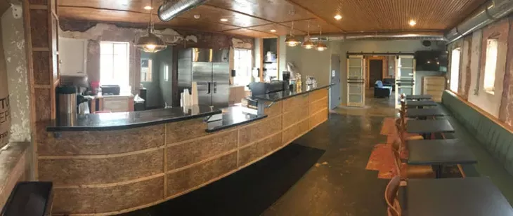 Classen Coffee Company, housed in a building that sat empty for nearly 50 years, has plenty of exposed brick. | Photo provided