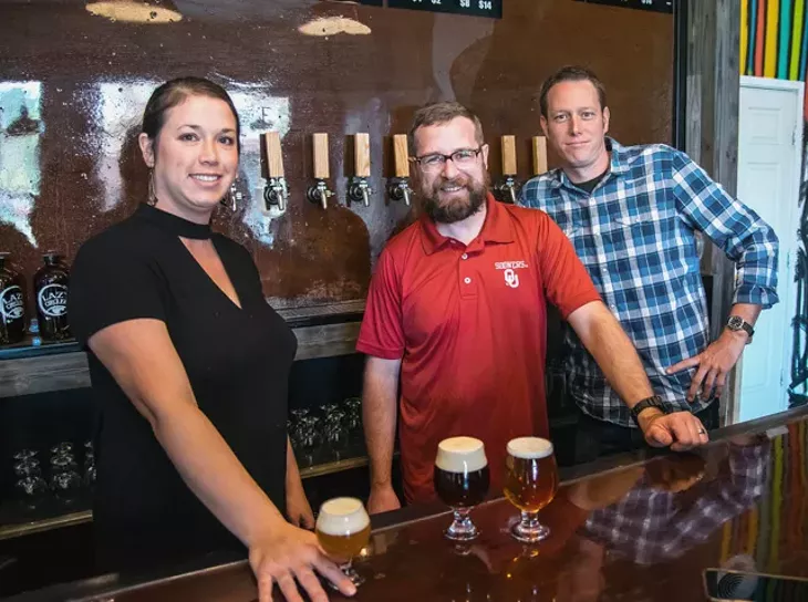 from left Holly and Stephen Swanson, with co-owner Stephen Basey, are keeping it simple and strong at Norman’s Lazy Circles Brewing. (Photo Mark Hancock)