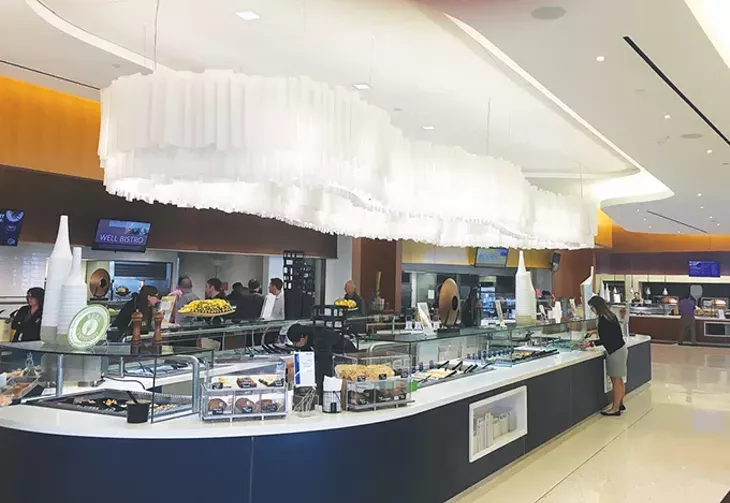 A $250,000 chandelier hangs over the health bar at Nebu inside Devon Energy Center. - JACOB THREADGILL
