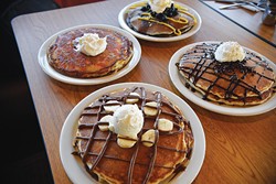 Banana-Nutella, blueberry, chocolate chip and pineapple upside-down cake pancakes from Sunnyside Diner - JACOB THREADGILL