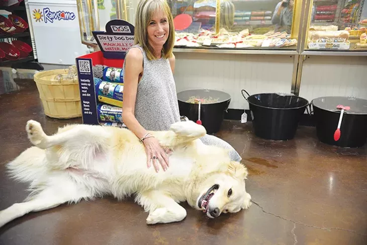 Mann’s Best Friend owner Lisa Jensen with her dog Annabella. - JACOB THREADGILL