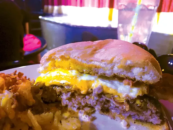 The breakfast burger and au gratin hash-browned potatoes - JACOB THREADGILL