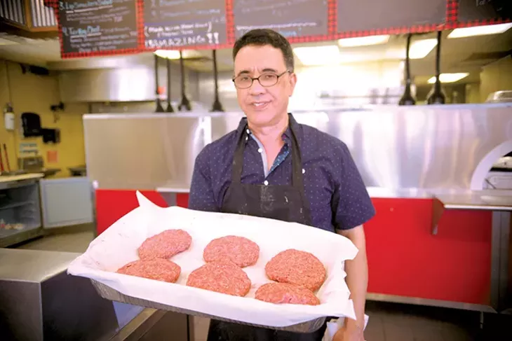 Jabbar Chaibainou serves inventive, fresh half-pound hamburgers for under $7. - JACOB THREADGILL