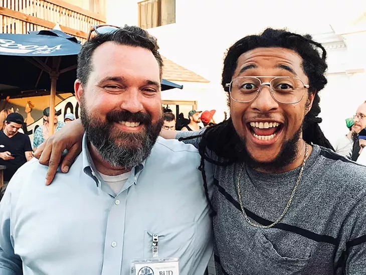 New Health Solutions Oklahoma executive director Bud Scott left poses for a photo with local rapper and artist Mike “Huckwheat” Huckeby right during the official Yes on 788 election night watch party at 51st Street Speakeasy. - SEAN VALI / PROVIDED