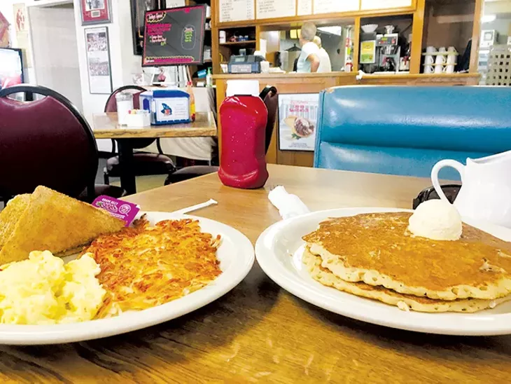 Pecan-filled pancakes are joined by excellent hash browns, eggs and toast. - JACOB THREADGILL