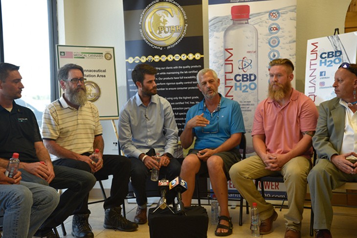 from left Oklahoma Cannabis Trade Association members Ryan Early, Chris Moe, Chance Gilbert, Chip Paul, Kyle Early and Scott Huffman hold a news conference at Can-Tek Labs. - BEN LUSCHEN