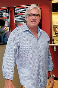 Rick Haynes co-owns Johnnie’s Charcoal Broiler with his brother David. - GAZETTE / FILE