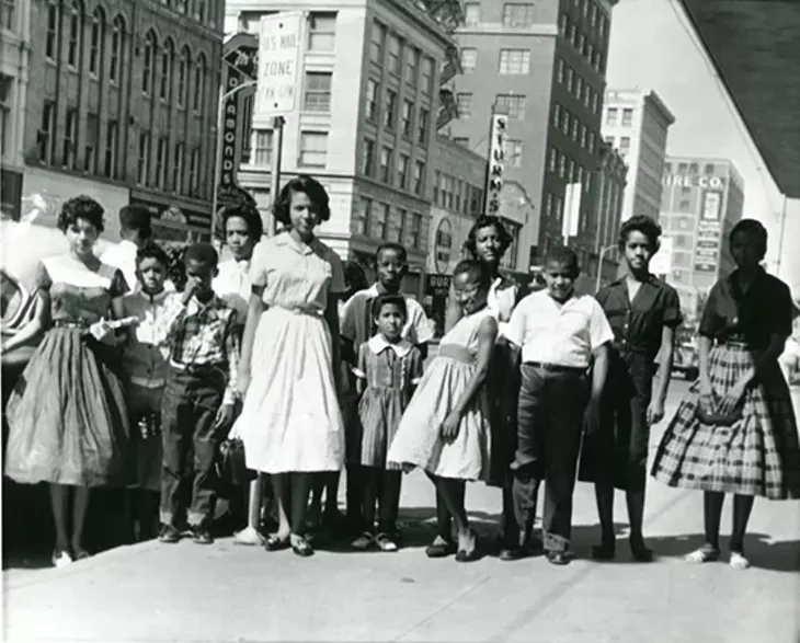 Youth gather outside John A. Brown department store before resuming the sit down in 1958. - OKLAHOMA HISTORY CENTER / PROVIDED