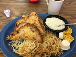 Blueberry French toast with hash browns and grits - JACOB THREADGILL
