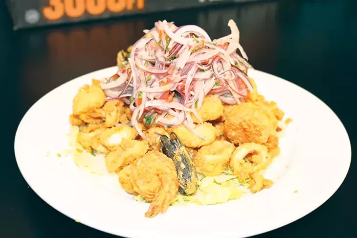 Jalea Mixto is tempura-fried seafood with lime-marinated onions. - PROVIDED