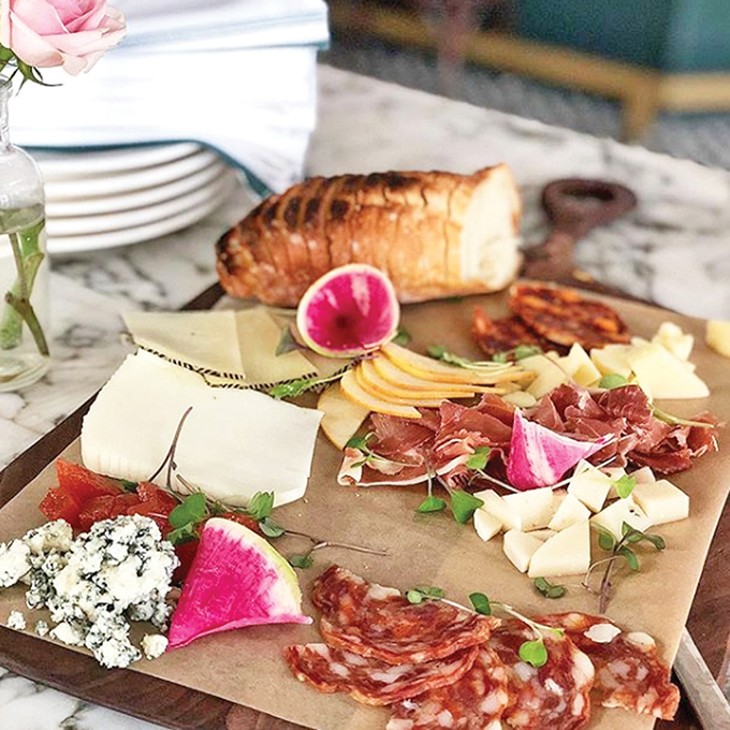 A mixture of Spanish cheeses and meats on the Bar Arobolada cheese plate - PROVIDED