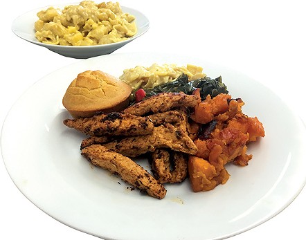 A Health Koncious plate featuring Cajun seitan bites, candied yams, collard greens, macaroni and cheese and cornbread. - JACOB THREADGILL