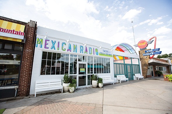 Mexican Radio’s patio is covered with a rainbow canopy that connects the restaurant to its vibrant 16th Street Plaza District neighborhood. - ALEXA ACE