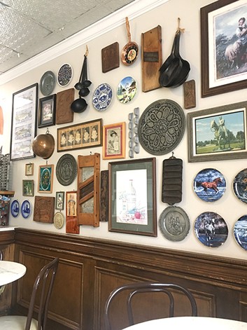 The walls inside The Brown Bag Deli are filled with Americana items. - JACOB THREADGILL