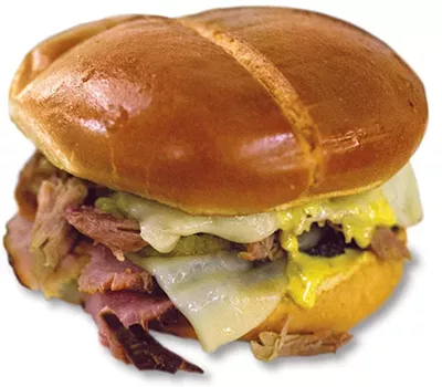 Cuban Boss sandwich with house-smoked ham, pulled pork, Swiss cheese, pickles and mustard sauce from Smoked Out BBQ - ALEXA ACE