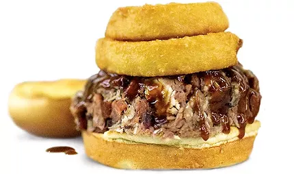 Samson is six meats — chicken, rib, brisket, pulled pork, hot link and ham — chopped together and topped with onion rings. - ALEXA ACE