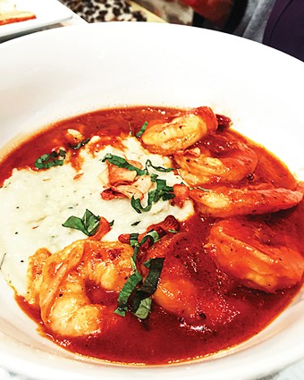 The shrimp and grits is available for breakfast and dinner at Aurora. - JACOB THREADGILL
