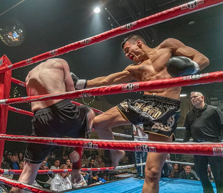 Bryon “Squirrelly” Harmon and Phillip Rose boxed in the main event at Buds and Brawls on Feb. 8. - PHILLIP DANNER