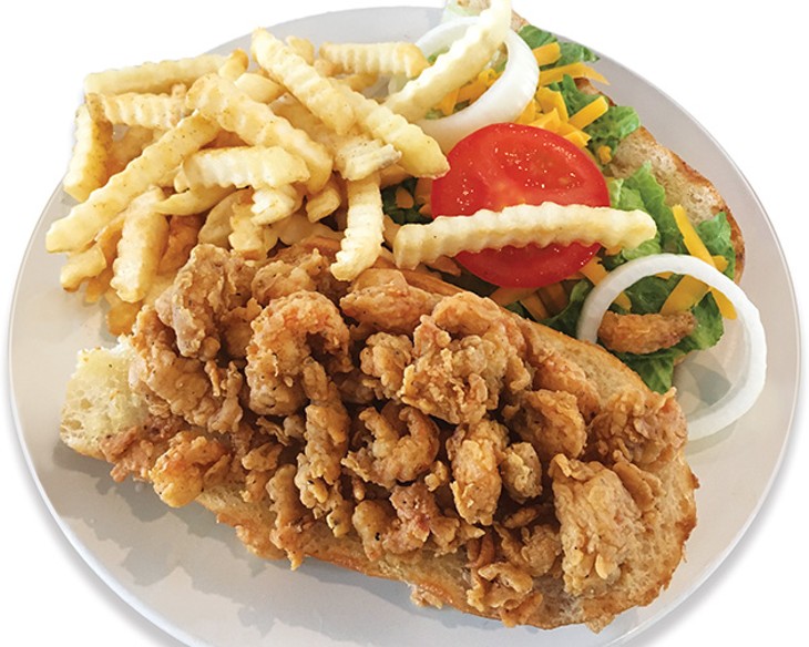 Crawfish “poe bouy” sandwich with crinkle-cut fries - JACOB THREADGILL