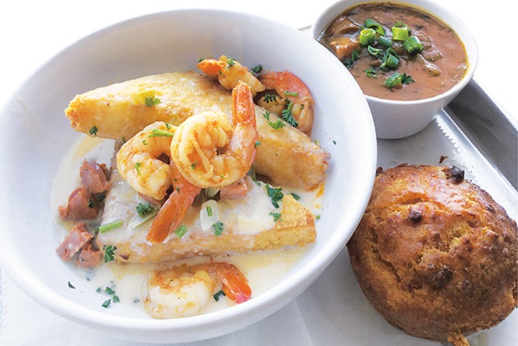 Shrimp with fried grits, a cup of gumbo and crawfish jalapeño cornbread at Magnolia Bistro - JACOB THREADGILL