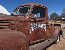 Fire Ranch Farms includes 23 buildings and a truck that serves as a sign. - NEISHA FORD