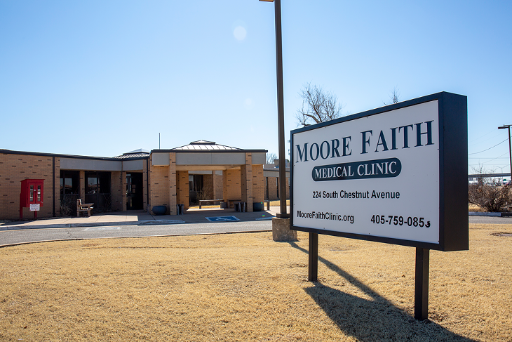 The outside of the Moore Faith Medical Clinic - BERLIN GREEN