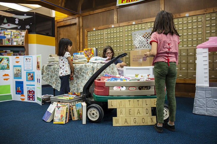 Little Read Wagon gives out books and pajamas. - BERLIN GREEN