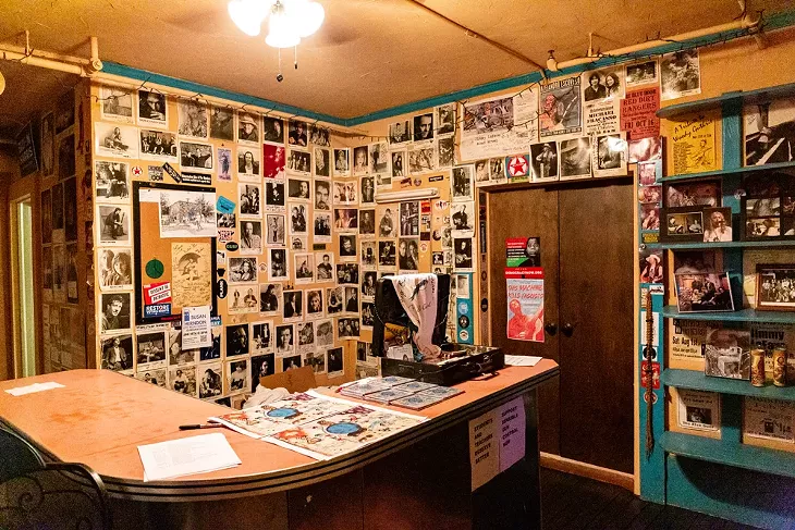 The lobby is filled with the photos and autographs of musicians who have played at The Blue Door over the years. - BERLIN GREEN