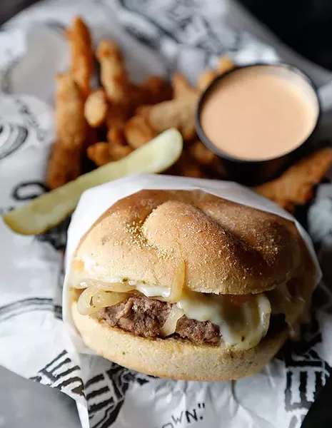 Hell’s Kitchen and chili fries at Flatire Burger in Edmond, Friday, April 17, 2015. - GARETT FISBECK