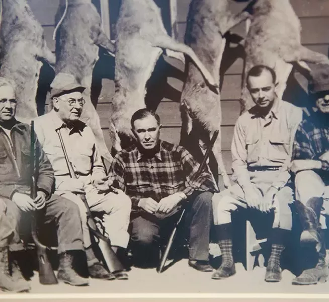 Detail from a photo hanging in Kent Frates' office, center is Charles Urschel, Machine Gun Kelly's kidnap victim, with Frates' Dad, C.L. Frates at right, and and U.S District Judge Edgar Vaught, the trial judge for the Machine Gun Kelly case, at left. mh
