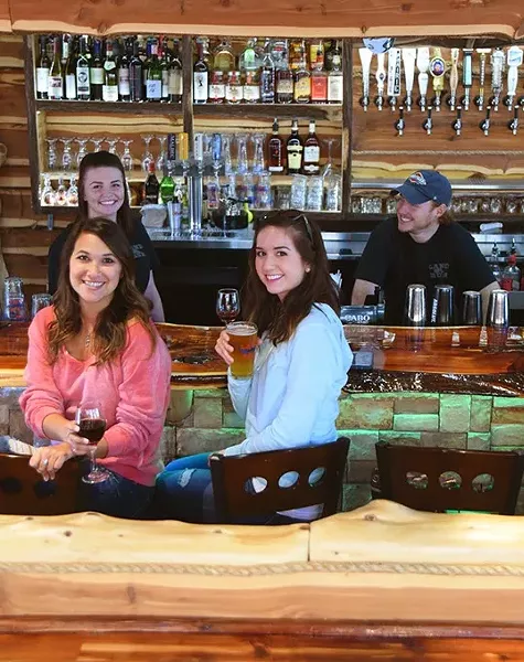 Yes, they have wine and they have beer, and food too, at Land Run Grill & Wine Bar. mh