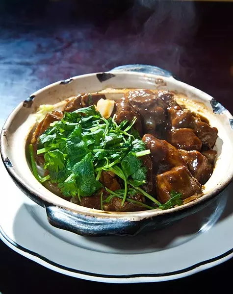 Spare rips with black mushroom hot pot. (Mark Hancock)