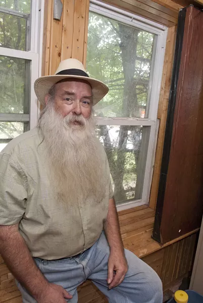 bob in his highly shaded home which has thick, insulated walls and interior shutters (right) he can pull across the window to conserve heat or cold energy. mh