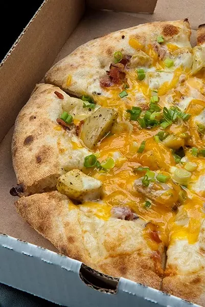 The Loaded Potato Pizza at Revolver, - MARK HANCOCK